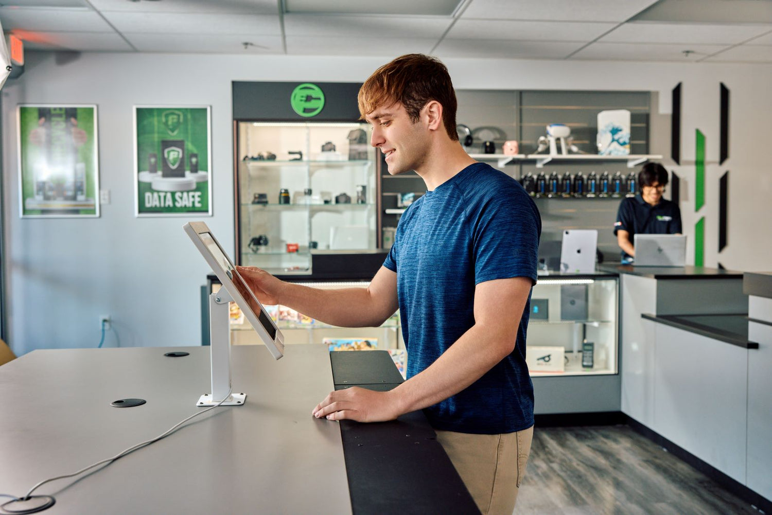 man shopping on tablet