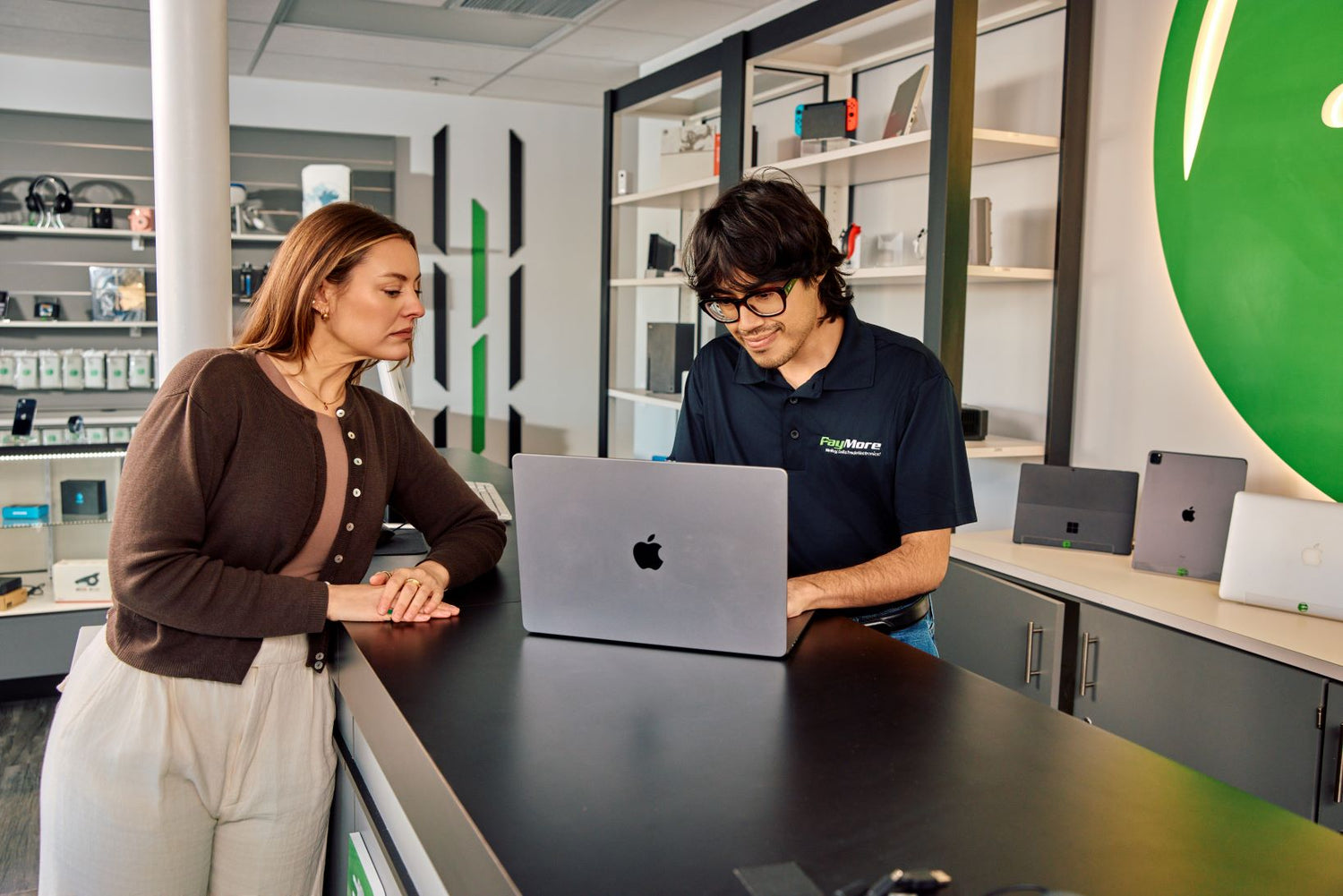 employee testing a laptop